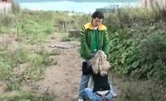 Amateur blonde giving headjob outside