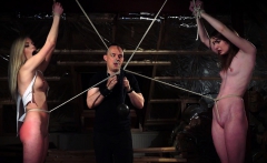 BDSM Punishing two teen slaves using leather whip