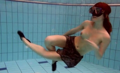 Big tits brunette Mia underwater naked