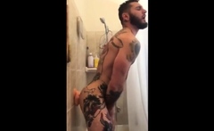 Tatted Hunk Fucks Dildo In Shower Until He Cums