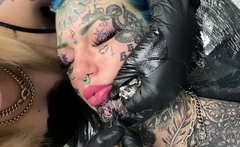 Australian bombshell Amber Luke gets a new chin tattoo