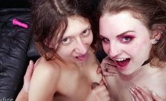 Two captivating brunette lesbians caressing and fingering