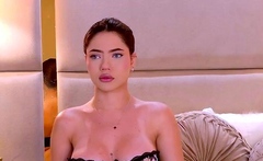 Busty babe playing with her big boobs