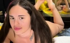 Busty babe playing with her big boobs