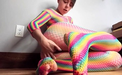 Teen in Rainbow Fishnets Fingers Herself